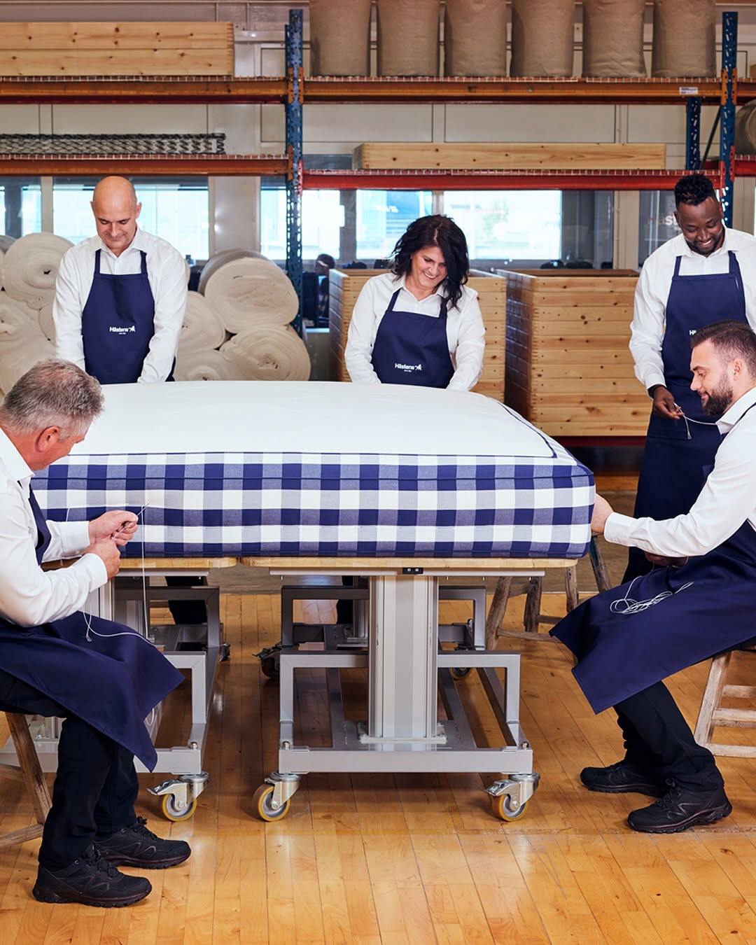 Hästens artisans hand-tufting a bed today, Köping workshop